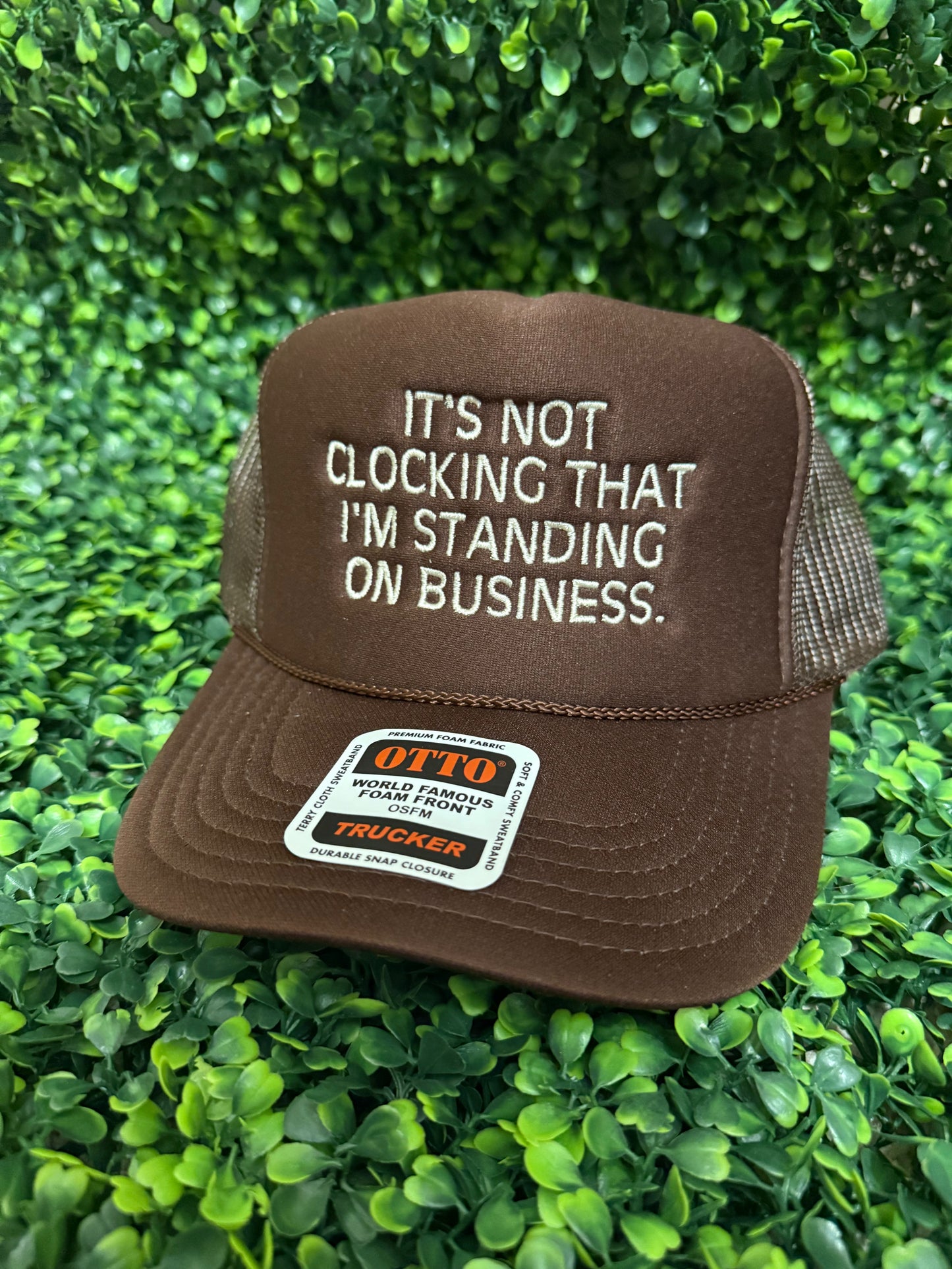 Standing on Business Trucker Hat